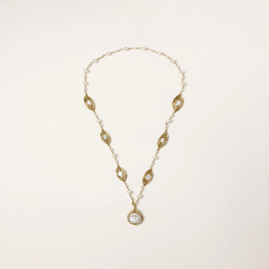 14K gold plated necklace with organic leaf motifs and freshwater pearls arranged in an elegant chain design on neutral background.