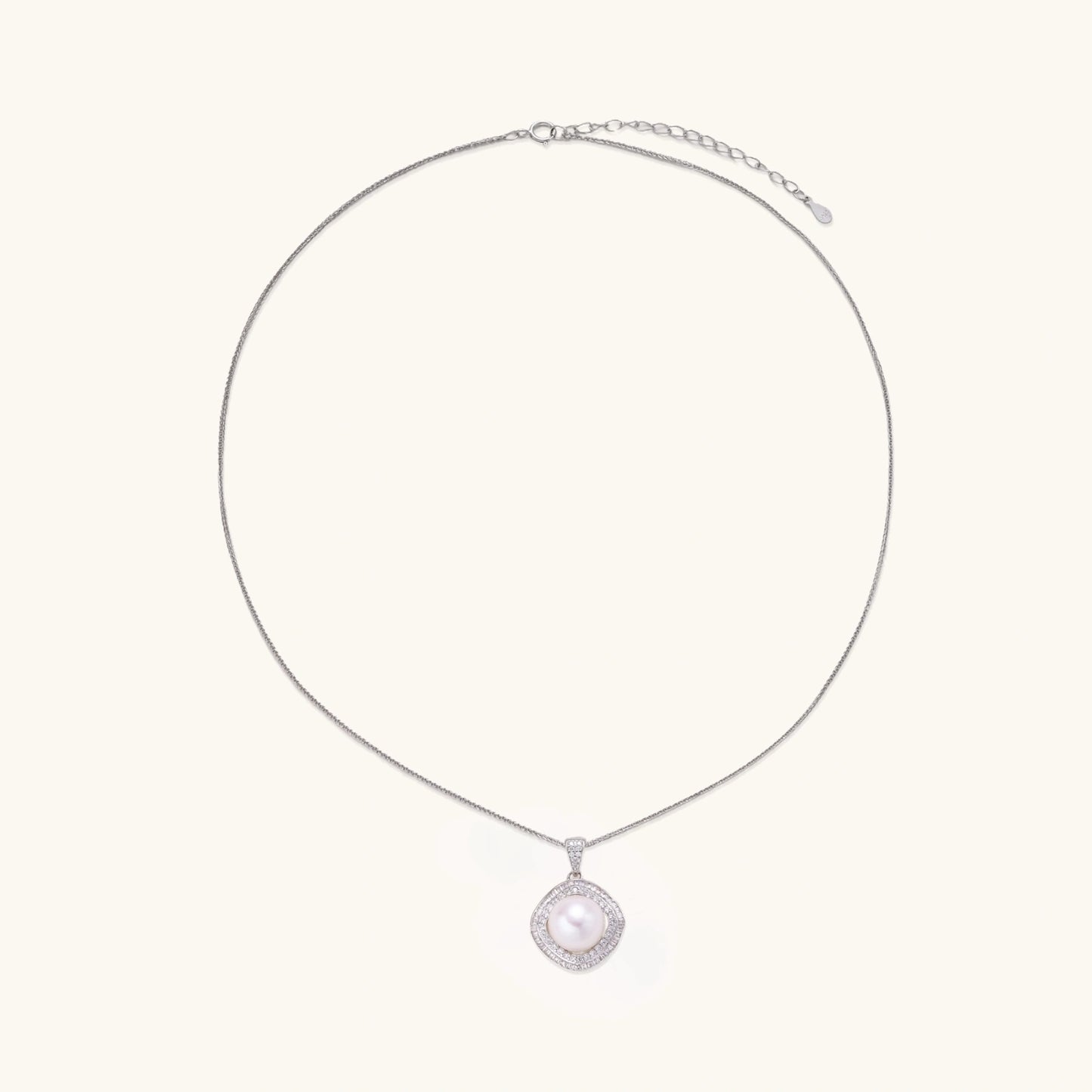 Cushion-shaped double halo pendant with 10mm freshwater pearl center on rhodium-plated sterling silver chain
